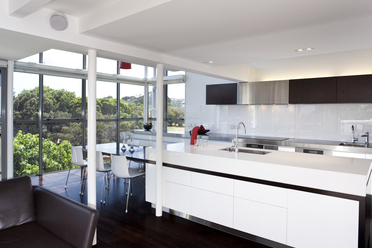 This light-filled kitchen is orientated to harness the countertop, interior design, kitchen, real estate, gray, white