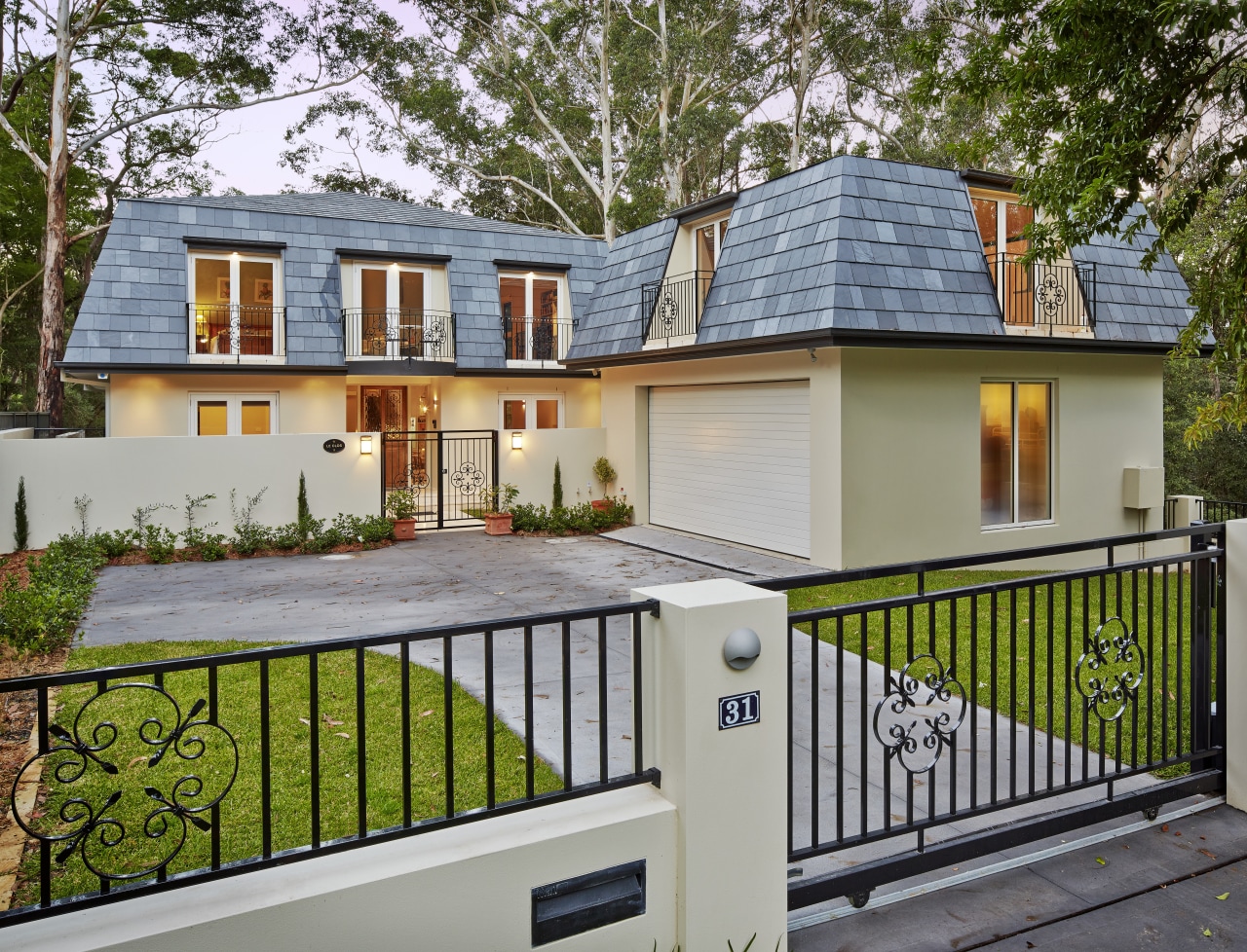 Tucked beneath a towering gum tree canopy, this cottage, estate, facade, home, house, property, real estate, residential area, gray