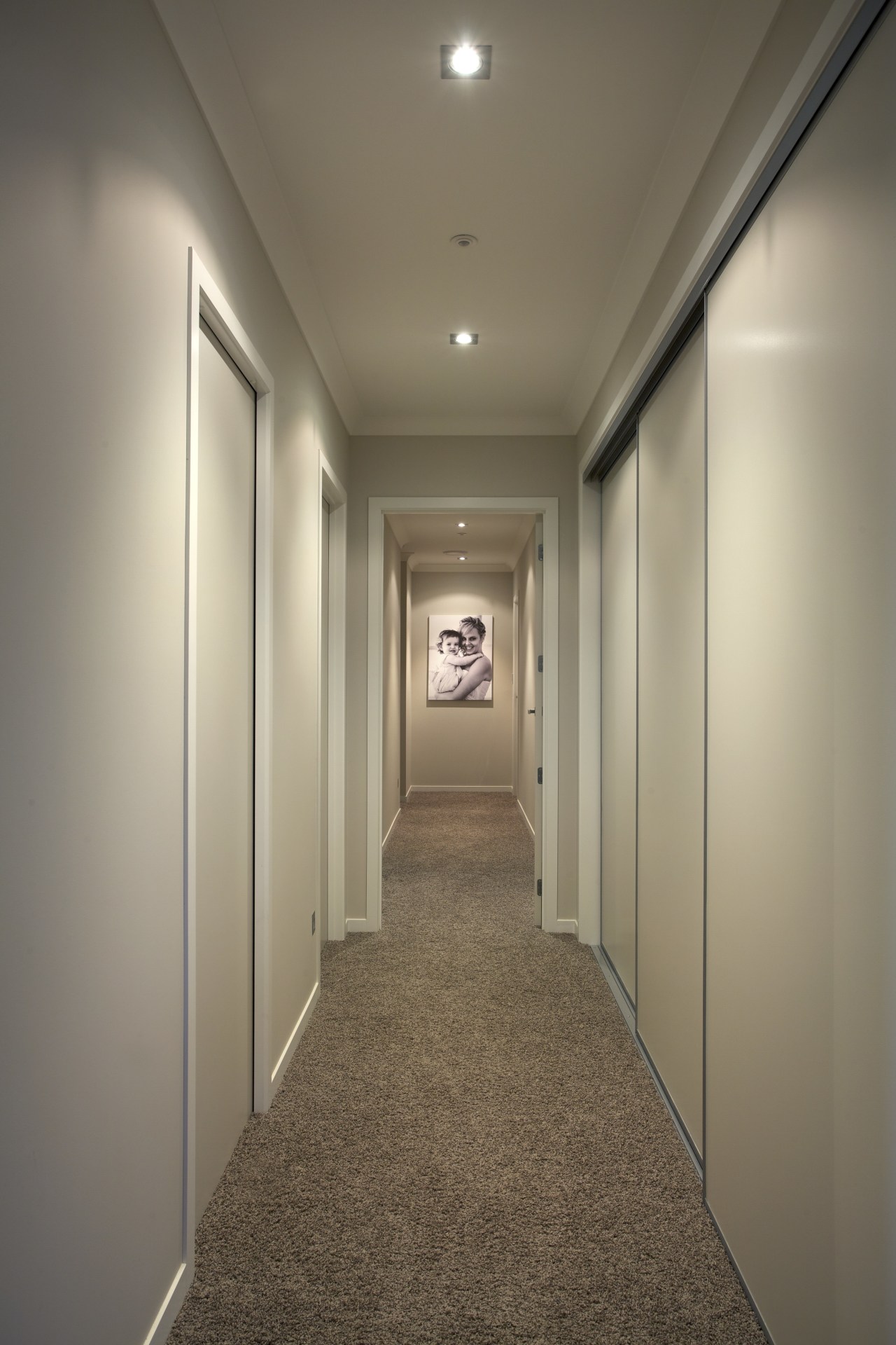 The house features a mix of solid oak ceiling, daylighting, floor, flooring, hall, home, interior design, lighting, real estate, brown, gray