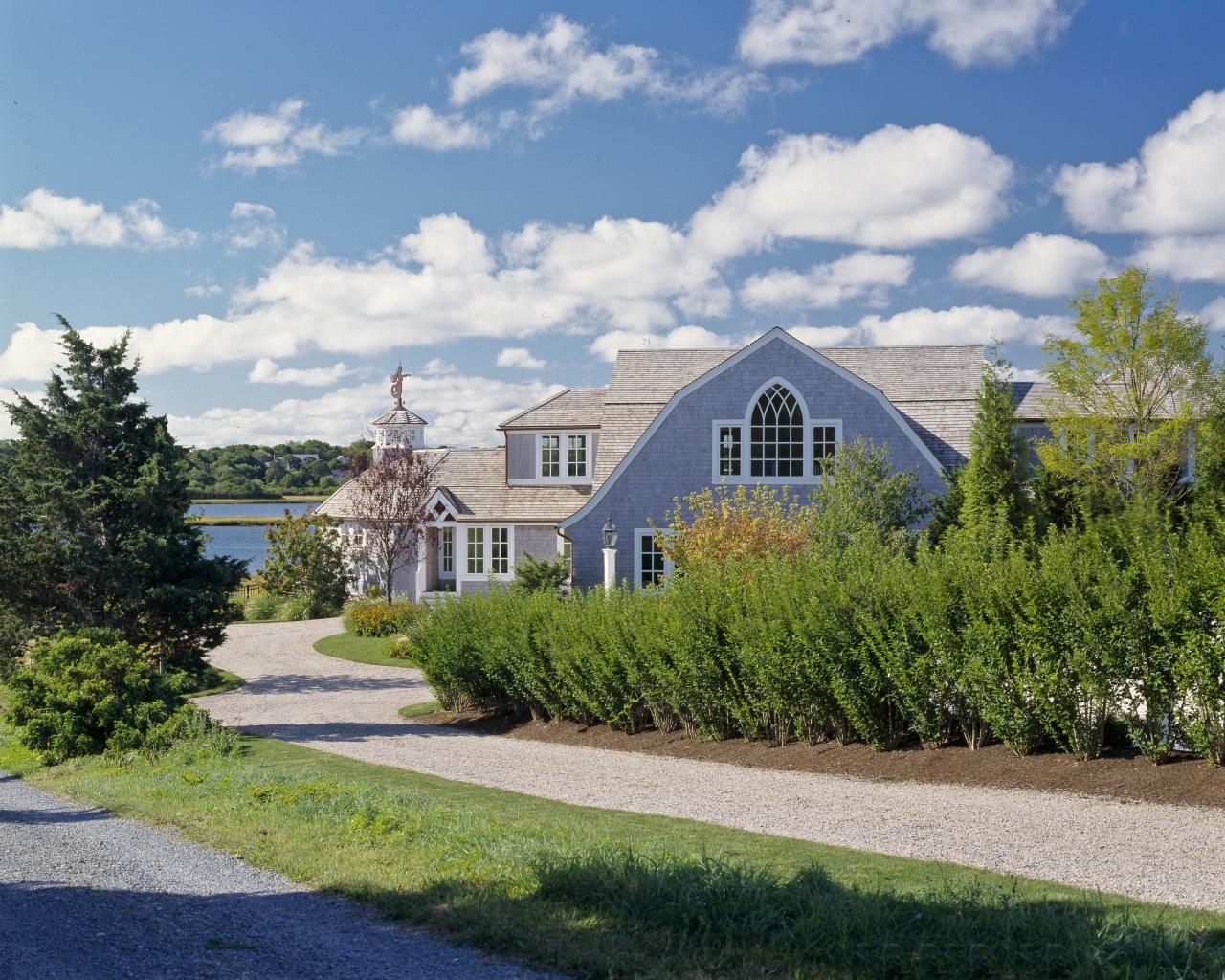 US2908 40509~~~Cape Codtraditional housetraditional homeshingle stylegambrel roofwaterfrontcedar cloud, cottage, estate, facade, farmhouse, garden, grass, home, house, land lot, landscape, mansion, plant, property, real estate, residential area, sky, suburb, tree