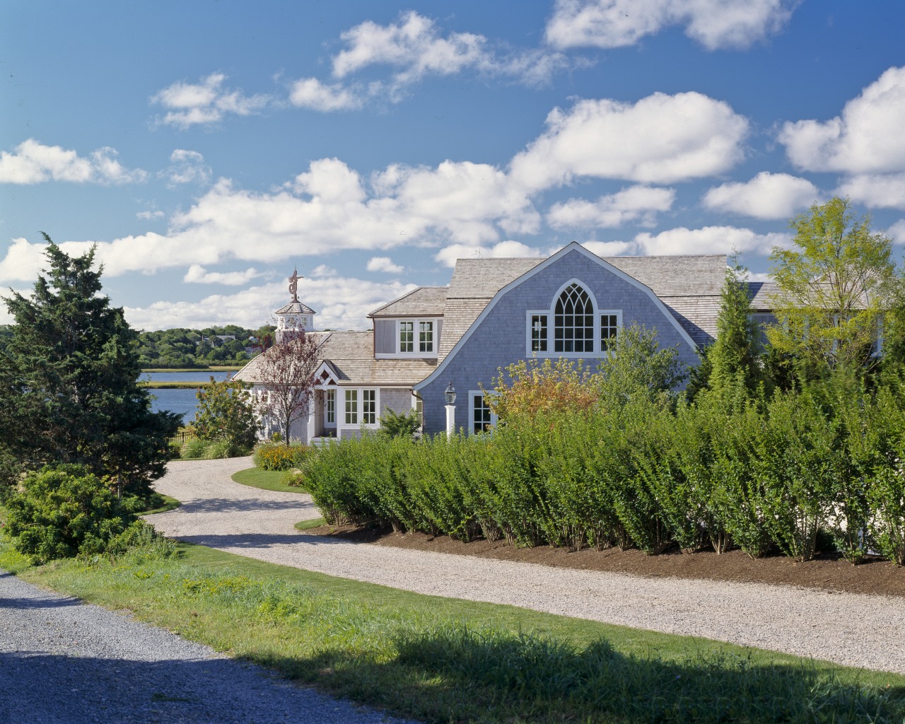 US2908  40509~~~Cape Codtraditional housetraditional homeshingle stylegambrel roofwaterfrontcedar cloud, cottage, estate, facade, farmhouse, garden, grass, home, house, land lot, landscape, mansion, plant, property, real estate, residential area, sky, suburb, tree