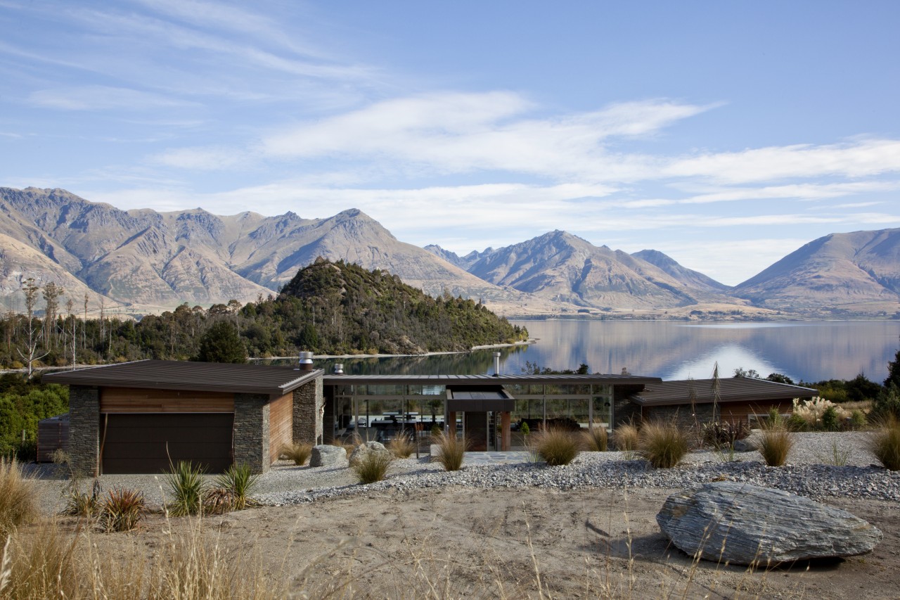 With a slender profile and a pitch that cloud, elevation, home, house, landscape, mountain, mountain range, mountainous landforms, national park, real estate, reflection, sky, tree, water, wilderness, winter