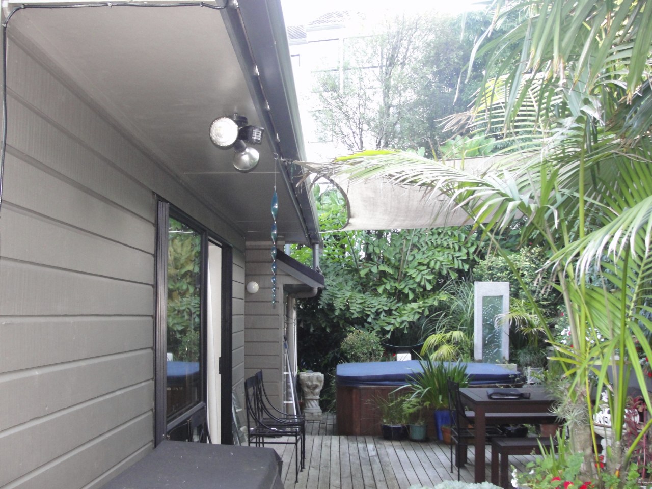 All-weather coverage  outdoor solutions from Awesome Awnings home, house, property, real estate, roof, tree, gray