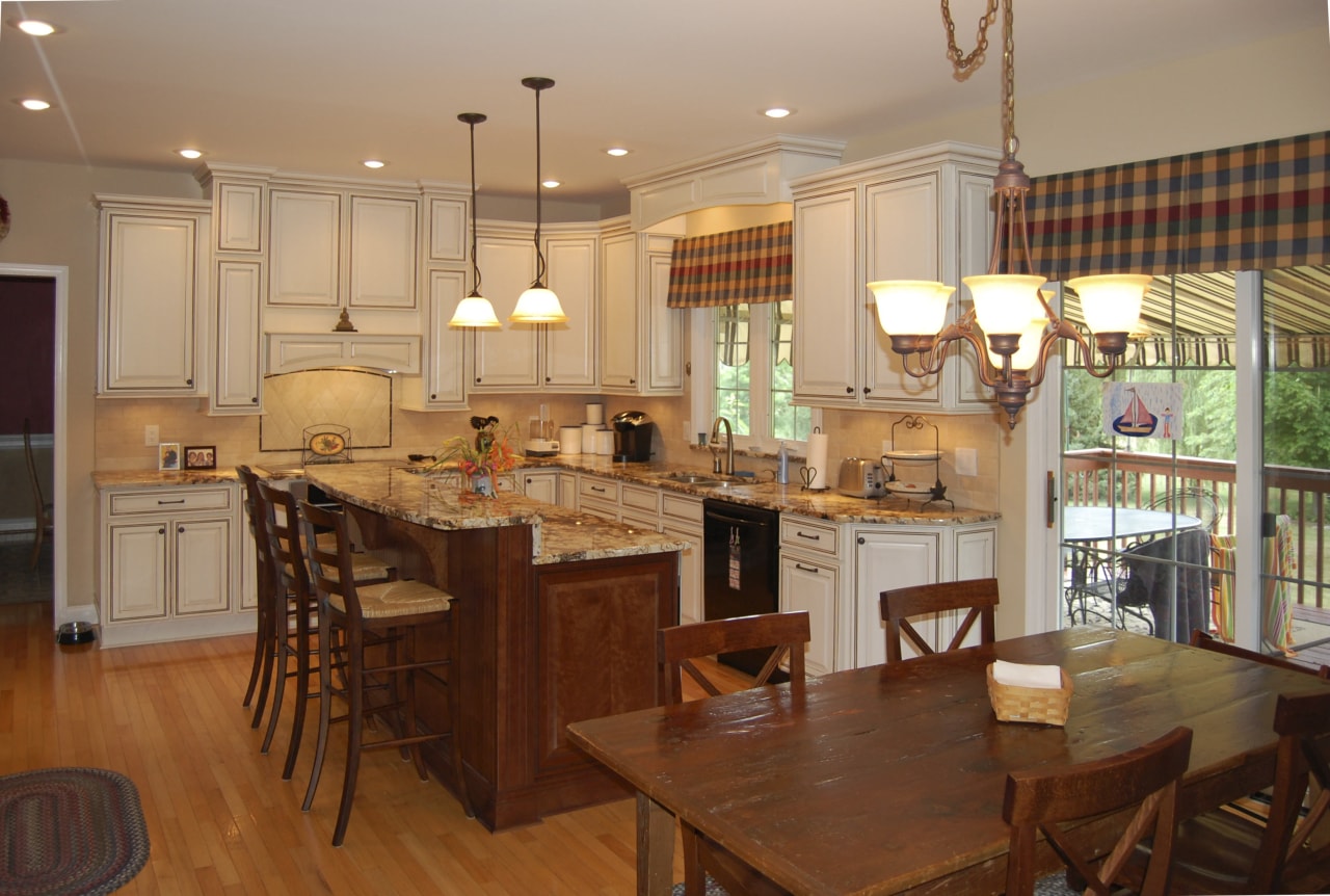 Remodeling this kitchen has given it a stronger cabinetry, countertop, cuisine classique, dining room, flooring, home, interior design, kitchen, real estate, room, wood, brown, orange