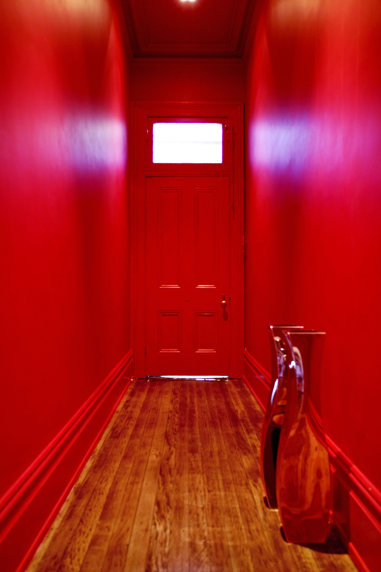 A lively palette of Resene colours has transformed floor, flooring, interior design, light, lighting, red, room, wood, red