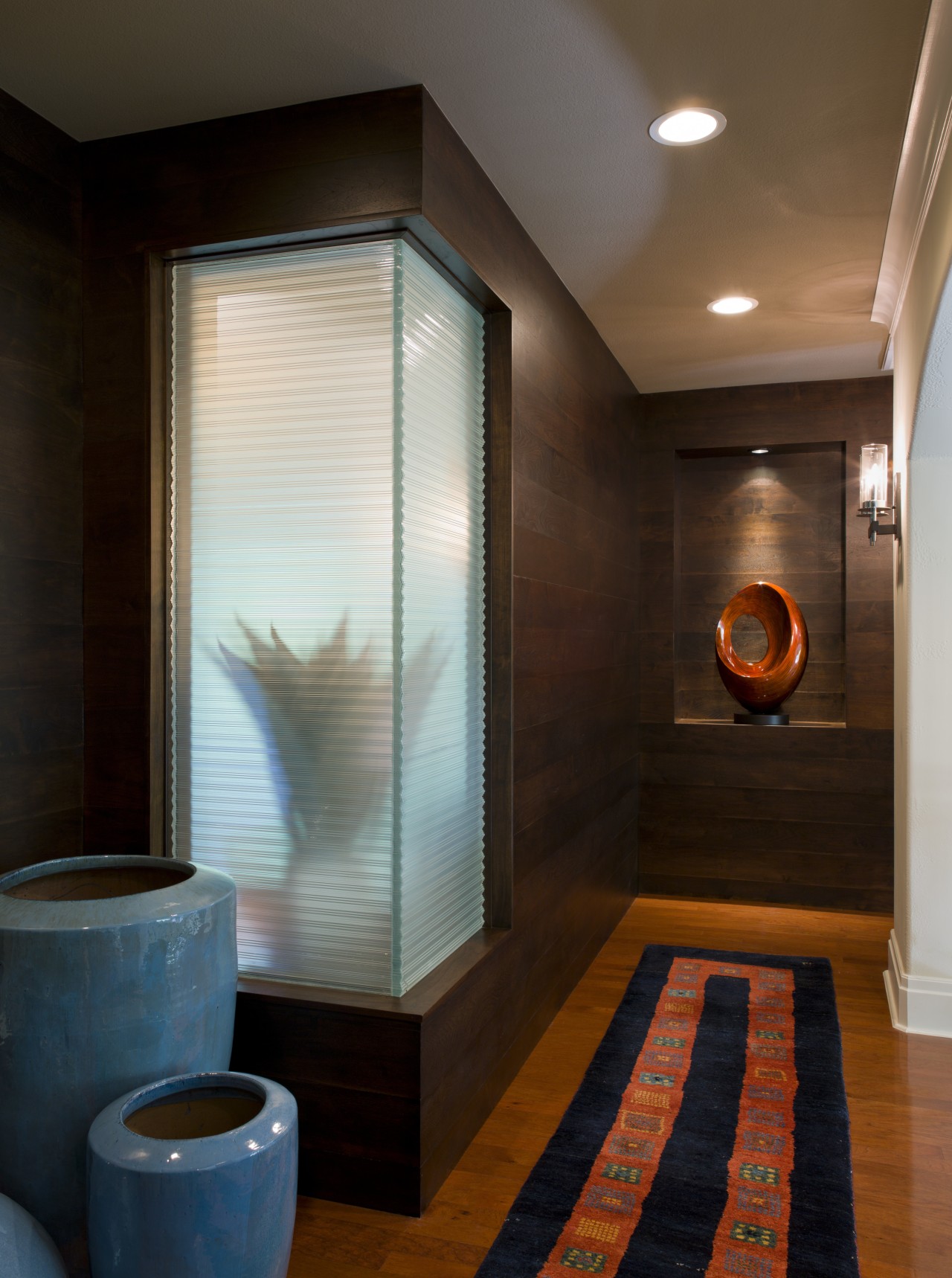 This hallway features walnut paneling. The corner window architecture, bathroom, ceiling, interior design, room, black, brown