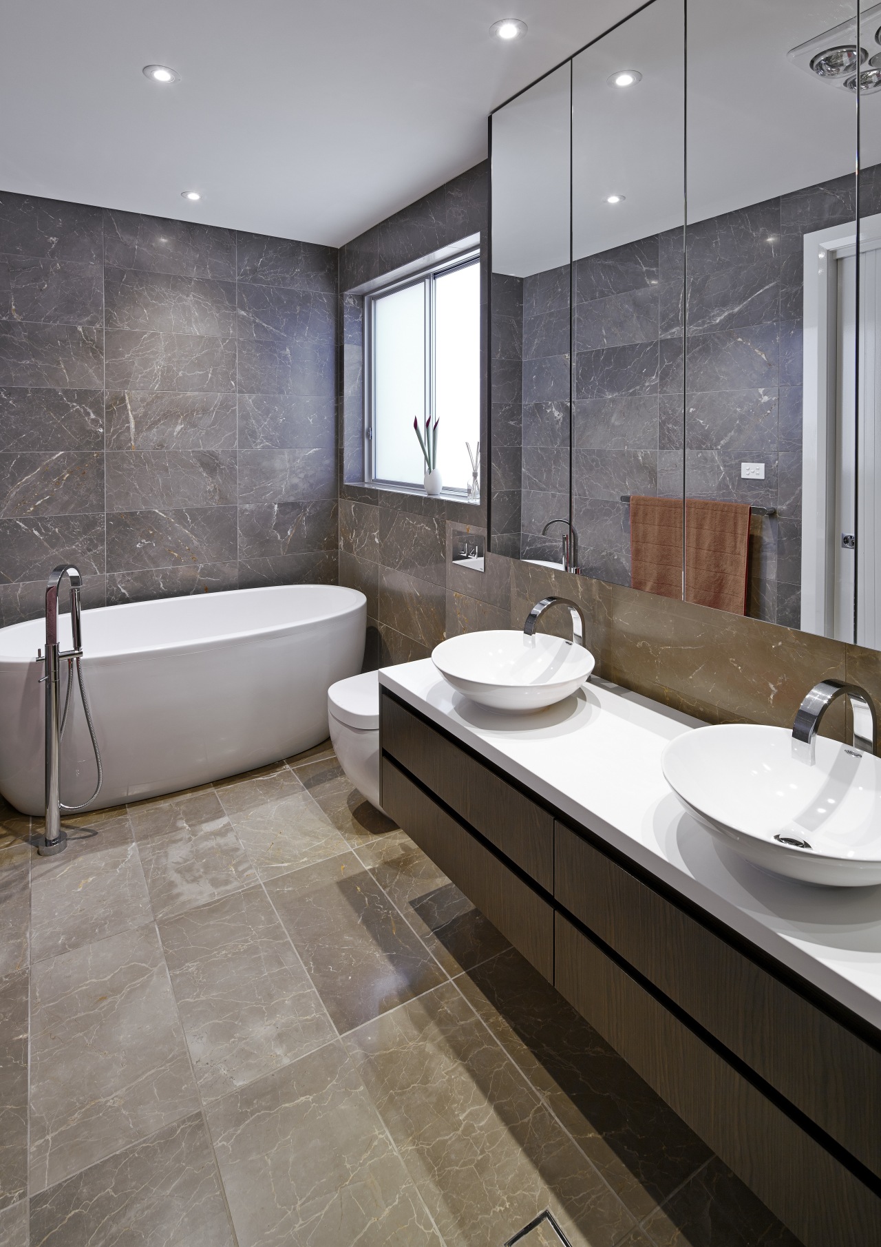 Contemporary three level home by Starr Constructions. bathroom, floor, flooring, home, interior design, room, sink, tile, wall, gray