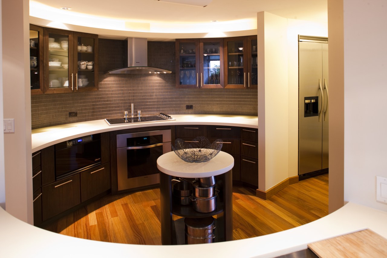 This kitchen with an Asian influence has an cabinetry, countertop, floor, flooring, interior design, kitchen, room, orange, brown