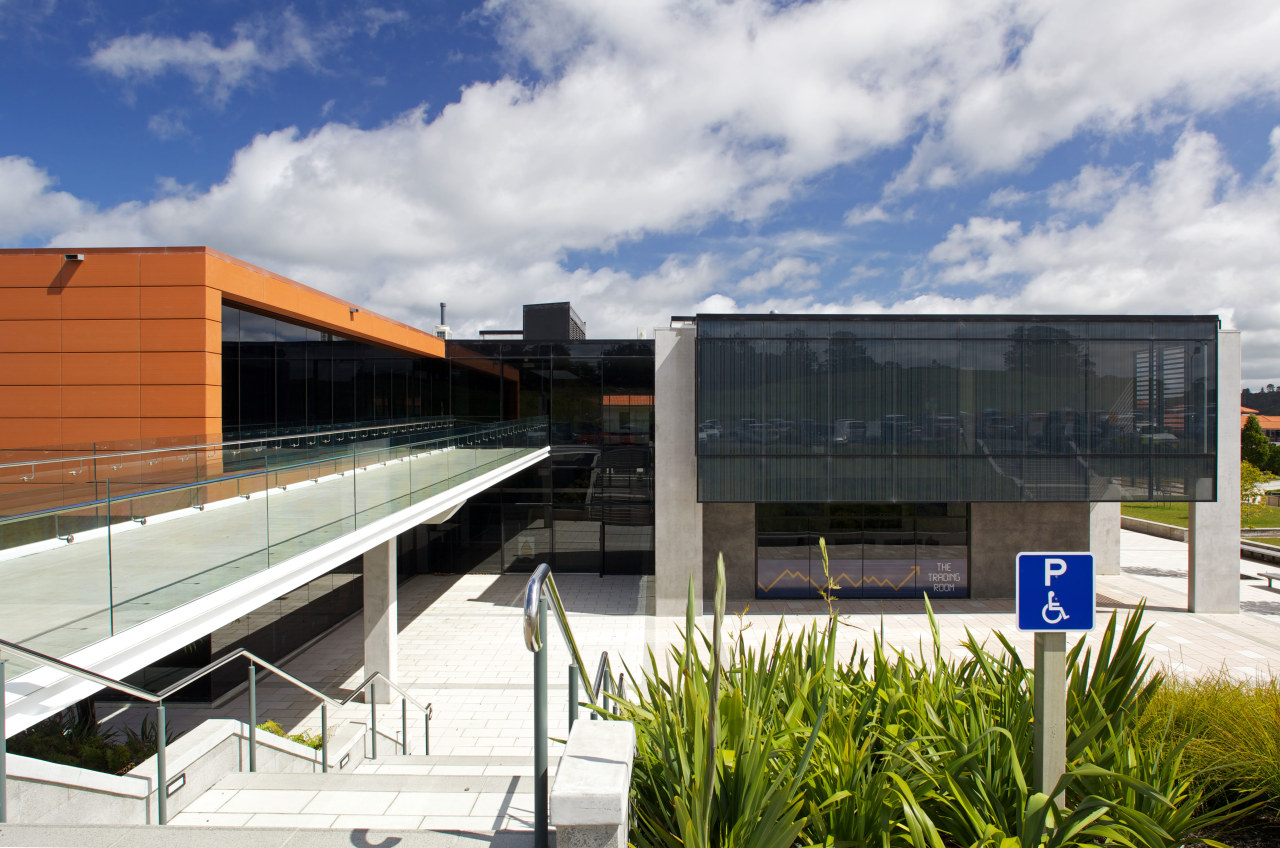 The clean-lined architecure of the facility is matched architecture, building, commercial building, corporate headquarters, facade, headquarters, metropolitan area, mixed use, real estate, sky, gray