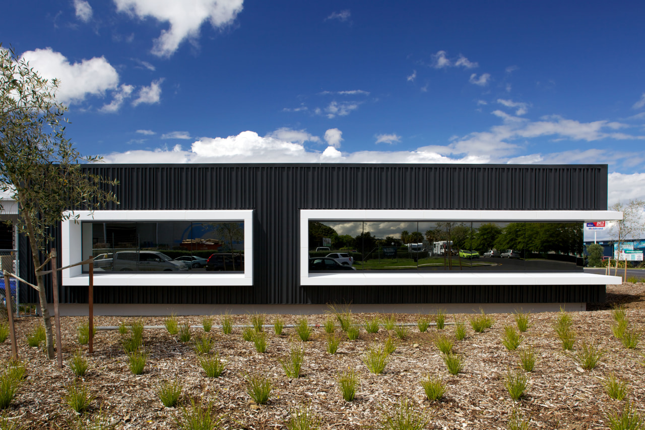 An architectural metal facade by Metal Design Solutions architecture, facade, house, real estate, shed, sky, blue