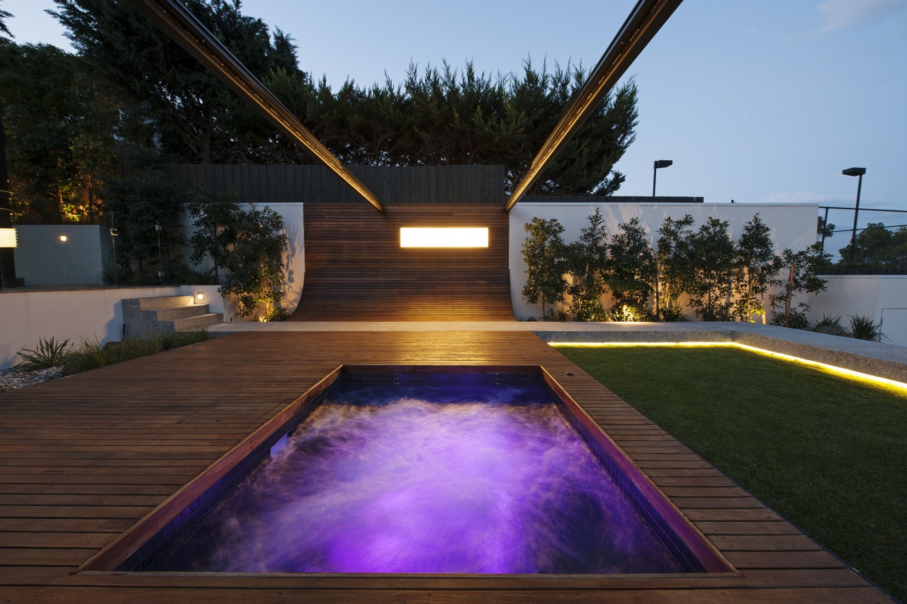 The action of filtration in a spa architecture, backyard, estate, home, house, landscape, landscape lighting, lighting, property, real estate, reflection, swimming pool, water, wood, black