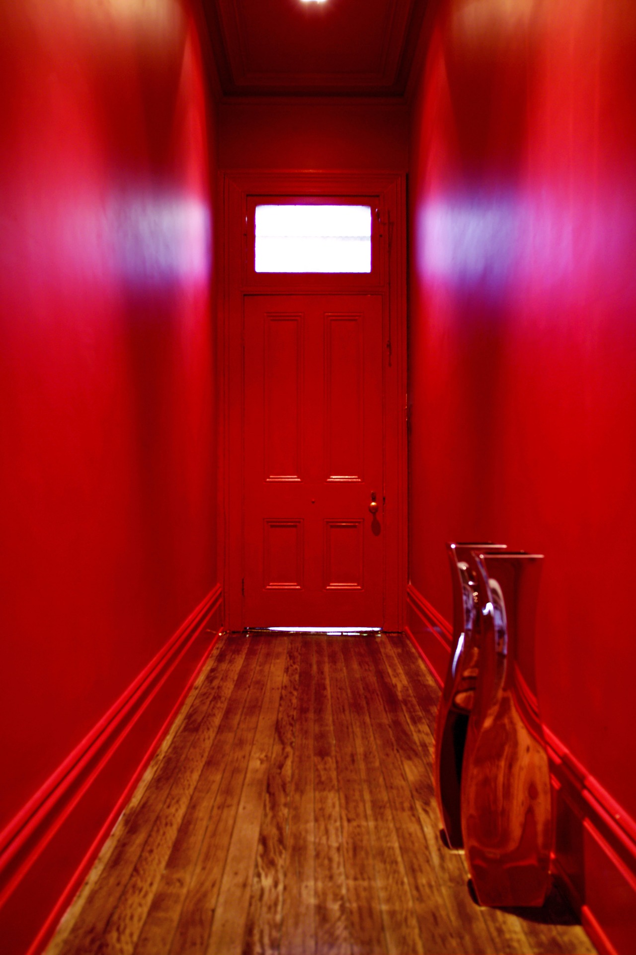 A lively palette of Resene colours has transformed floor, flooring, interior design, light, lighting, red, room, wood, red