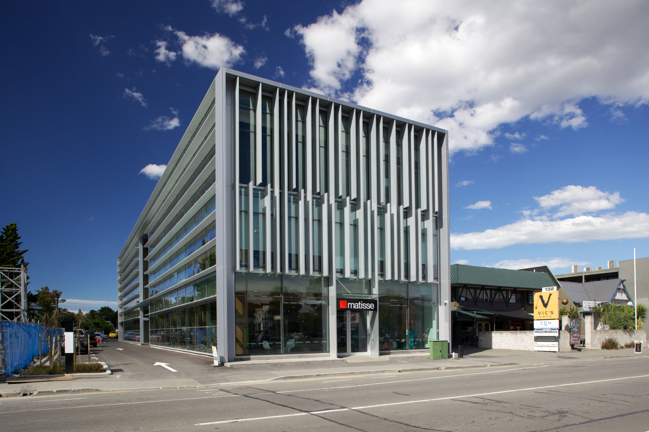 Large louvres and fins shield the new Young architecture, building, commercial building, condominium, corporate headquarters, facade, headquarters, metropolitan area, mixed use, real estate, sky, gray, blue