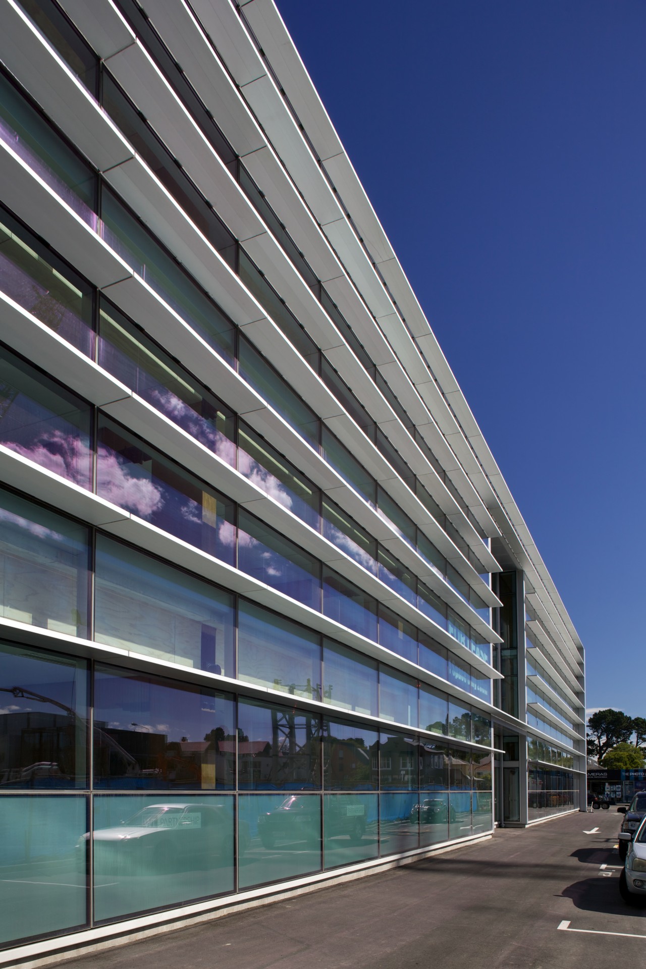 New seismic structural systems technology is transforming the architecture, building, commercial building, condominium, convention center, corporate headquarters, daylighting, daytime, facade, headquarters, infrastructure, line, metropolis, metropolitan area, mixed use, residential area, sky, structure, urban area, gray, blue