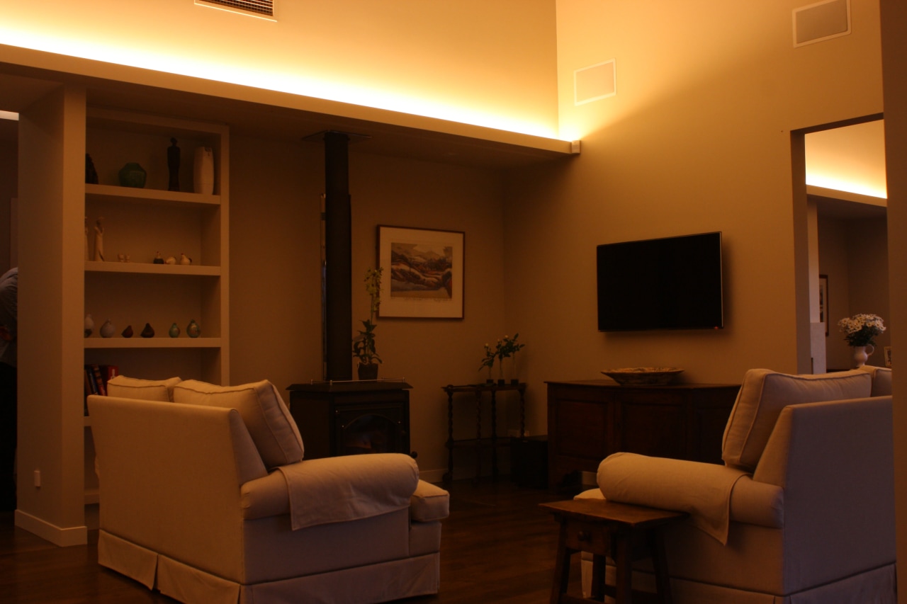 Evening mood lighting into living area with dimslim ceiling, furniture, home, interior design, light fixture, lighting, living room, room, window, brown