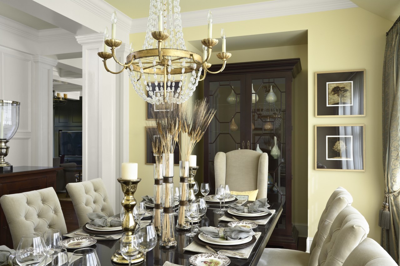 Traditional dining room with upholstered dining chairs, crown ceiling, chandelier, dining room, home, interior design, light fixture, living room, room, table, gray