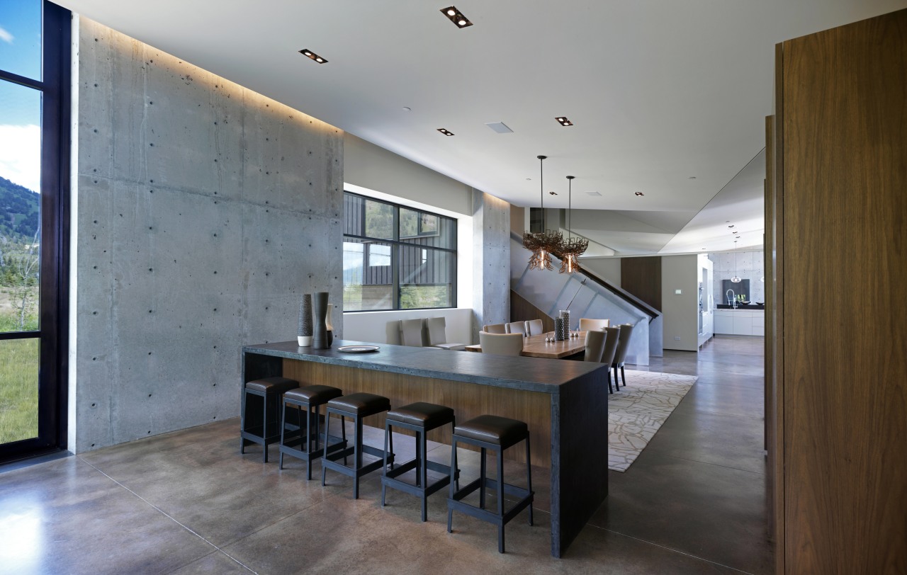 The interior of this mountain home designed by architecture, ceiling, countertop, dining room, estate, floor, flooring, house, interior design, kitchen, real estate, room, table, gray