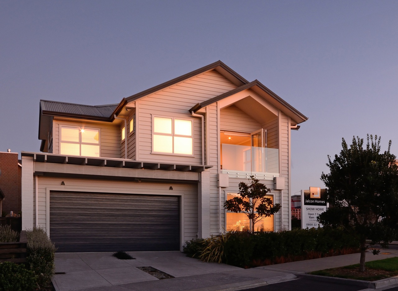 The Landing, a two-storey, weatherboard show home was building, elevation, facade, home, house, property, real estate, residential area, roof, siding, window, black, blue