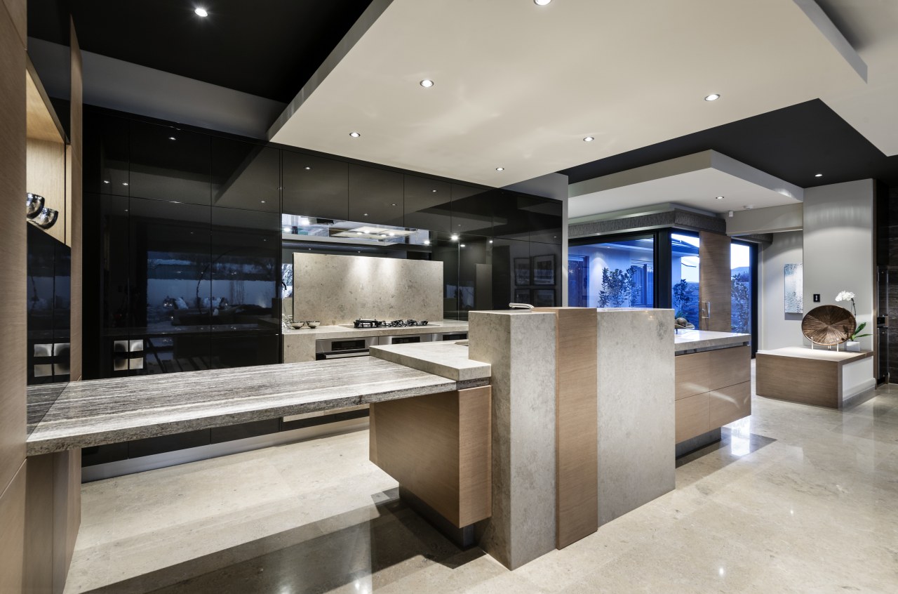 ELiving areas and kitchen are seamlessly integrated in countertop, interior design, kitchen, gray, black