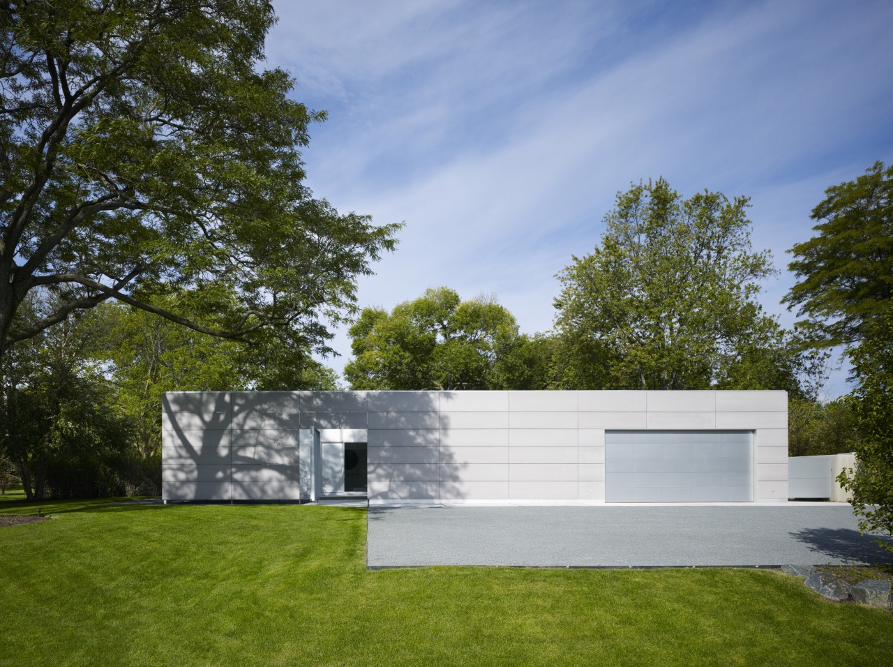 Mature trees cast dramatic shadows onto the walls architecture, backyard, cottage, daylighting, daytime, estate, facade, grass, home, house, landscape, property, real estate, residential area, shed, sky, yard, brown