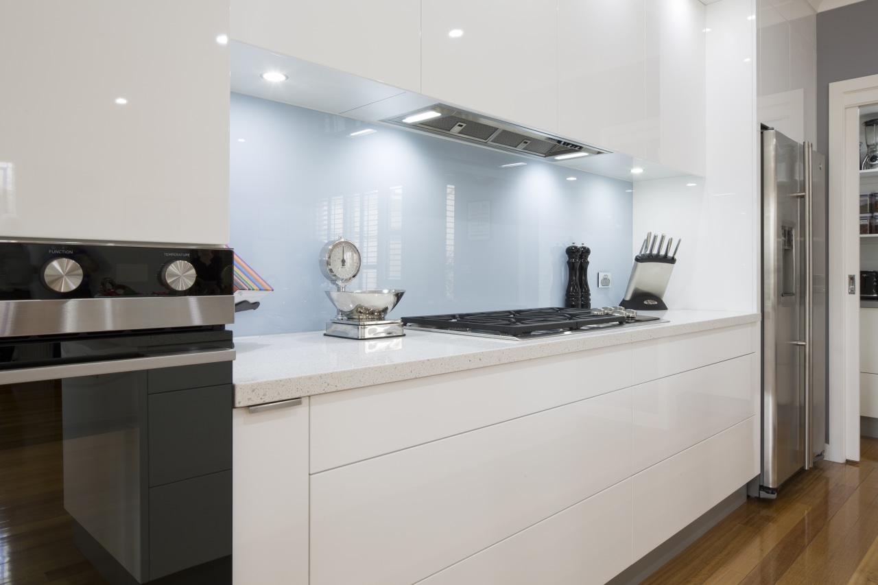 Clean-lined white kitchen by Kitchen & Home with cabinetry, countertop, cuisine classique, interior design, kitchen, room, gray