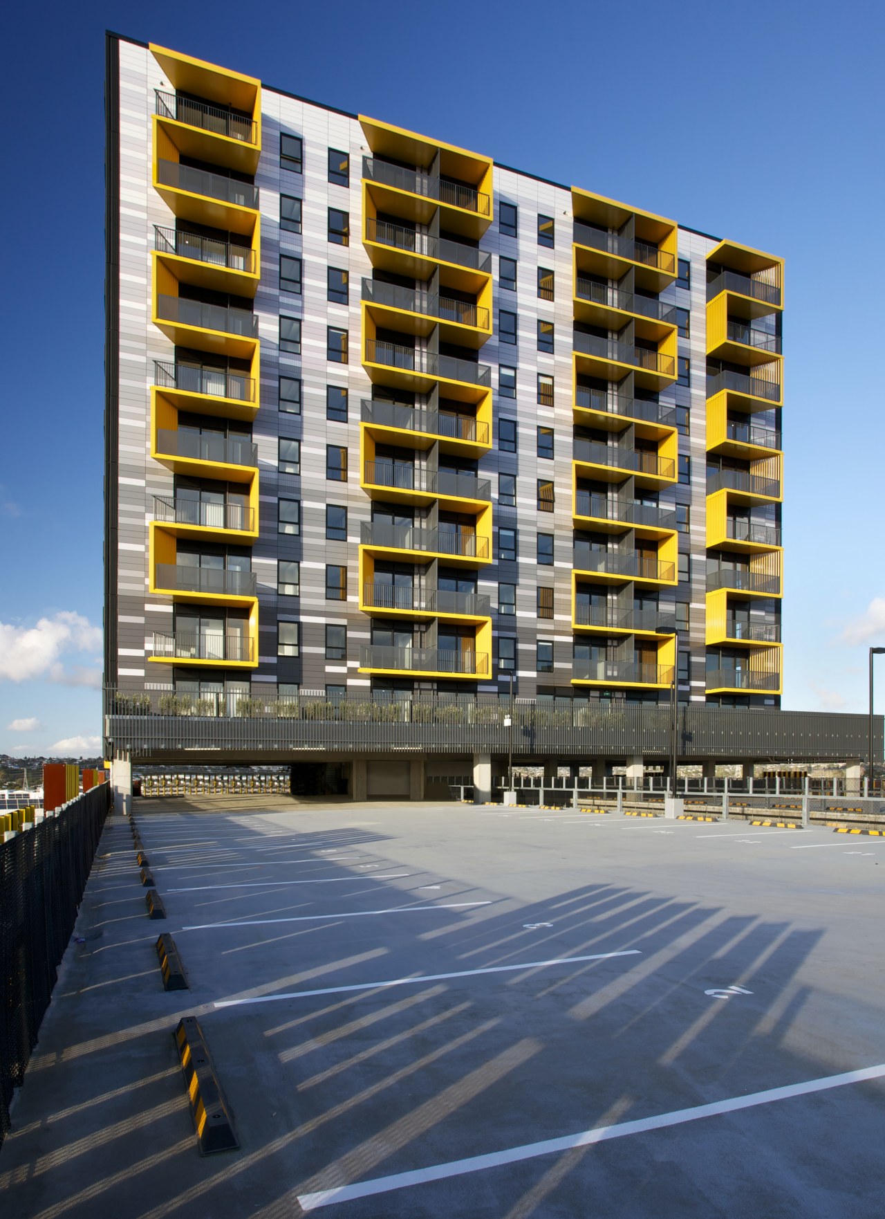 A fully customised Alucobond cladding system by Kaneba apartment, architecture, building, city, commercial building, condominium, corporate headquarters, daytime, facade, headquarters, house, metropolis, metropolitan area, mixed use, neighbourhood, real estate, reflection, residential area, sky, tower block, urban area