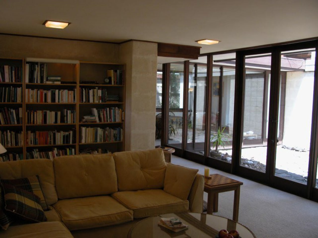 Before the renovation to this interior, bookcases covered interior design, living room, property, real estate, window, brown