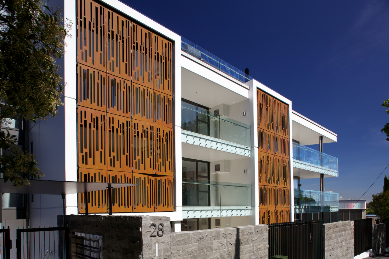 Powdercoated aluminium screens that resemble Corten steel feature apartment, architecture, building, commercial building, condominium, corporate headquarters, elevation, facade, home, house, mixed use, neighbourhood, property, real estate, residential area, window, blue, black