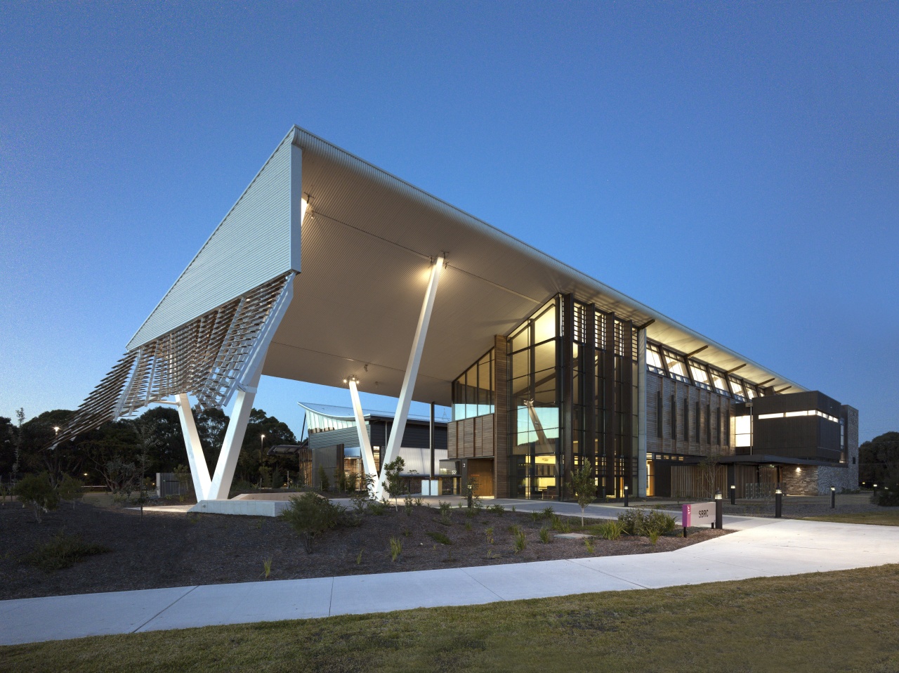 The Sustainable Buildings Research Centre at the University architecture, building, commercial building, convention center, corporate headquarters, facade, headquarters, mixed use, real estate, sky, structure, teal