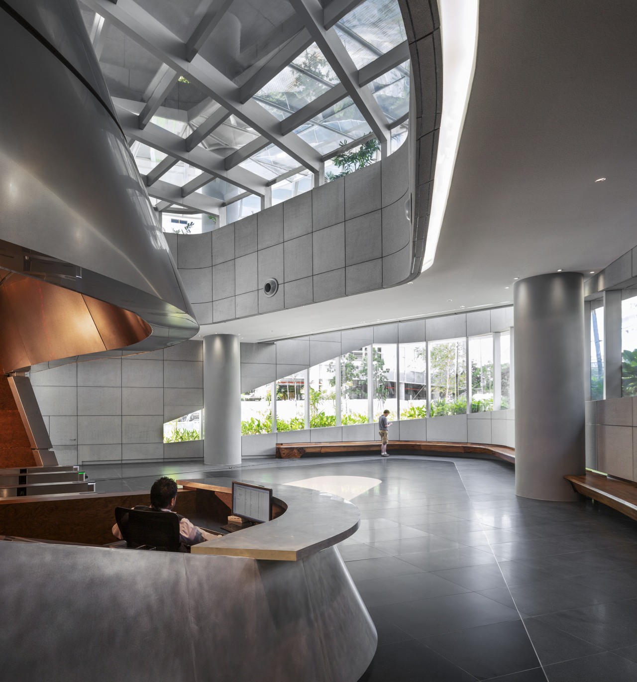 Aluminium panels clad the central pod in the architecture, ceiling, daylighting, house, interior design, lobby, loft, gray, black