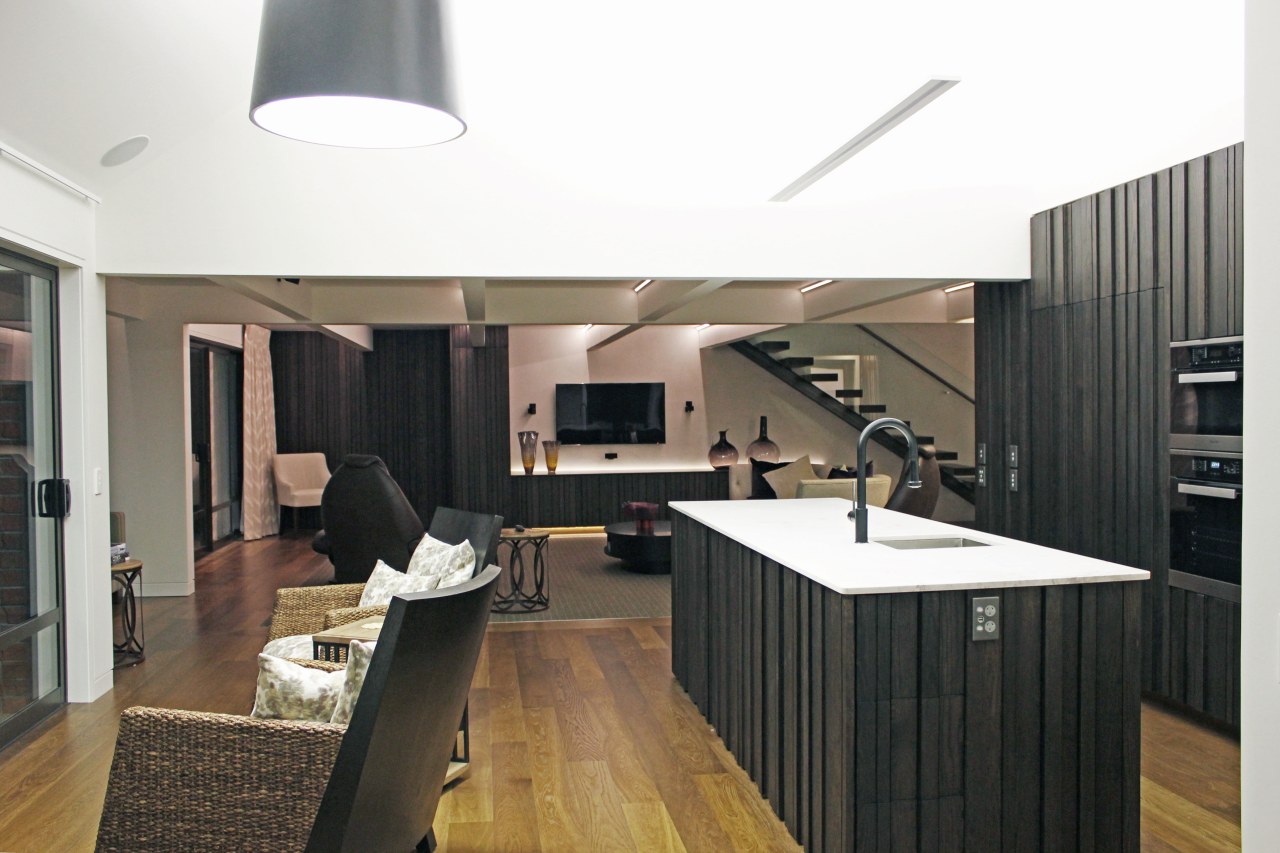 White marble contrasts the dark timber on this countertop, interior design, kitchen, white, black