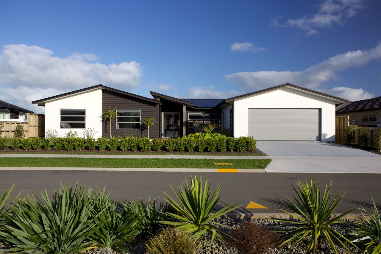 Dark-stained cedar weatherboards contrast white painted plaster and elevation, estate, facade, home, house, landscape, property, real estate, residential area, sky, blue