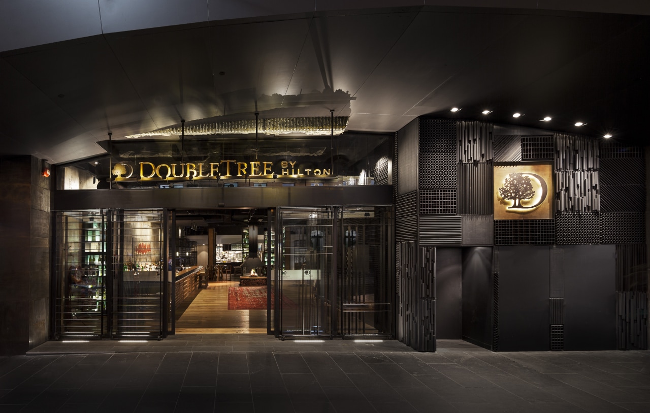 Raw and industrial, the exterior of the DoubleTree night, black