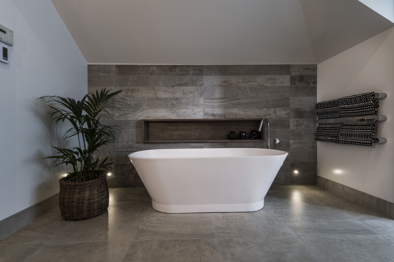 Stone look tile surfaces showcase the bathing space architecture, bathroom, floor, flooring, interior design, product design, room, tile, wall, gray