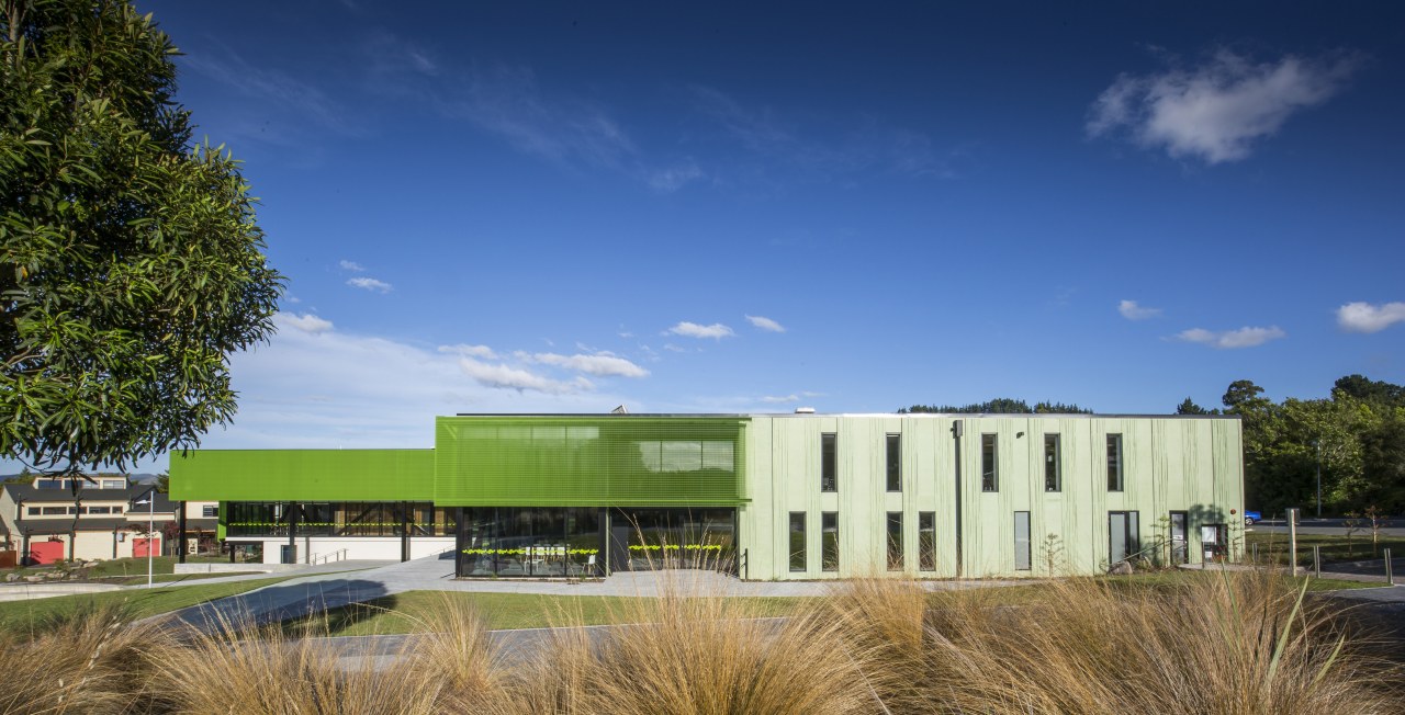 :Green mesh and patterned, pigmented green concrete envelope architecture, campus, cloud, corporate headquarters, daytime, estate, facade, grass, headquarters, home, house, property, real estate, sky, blue