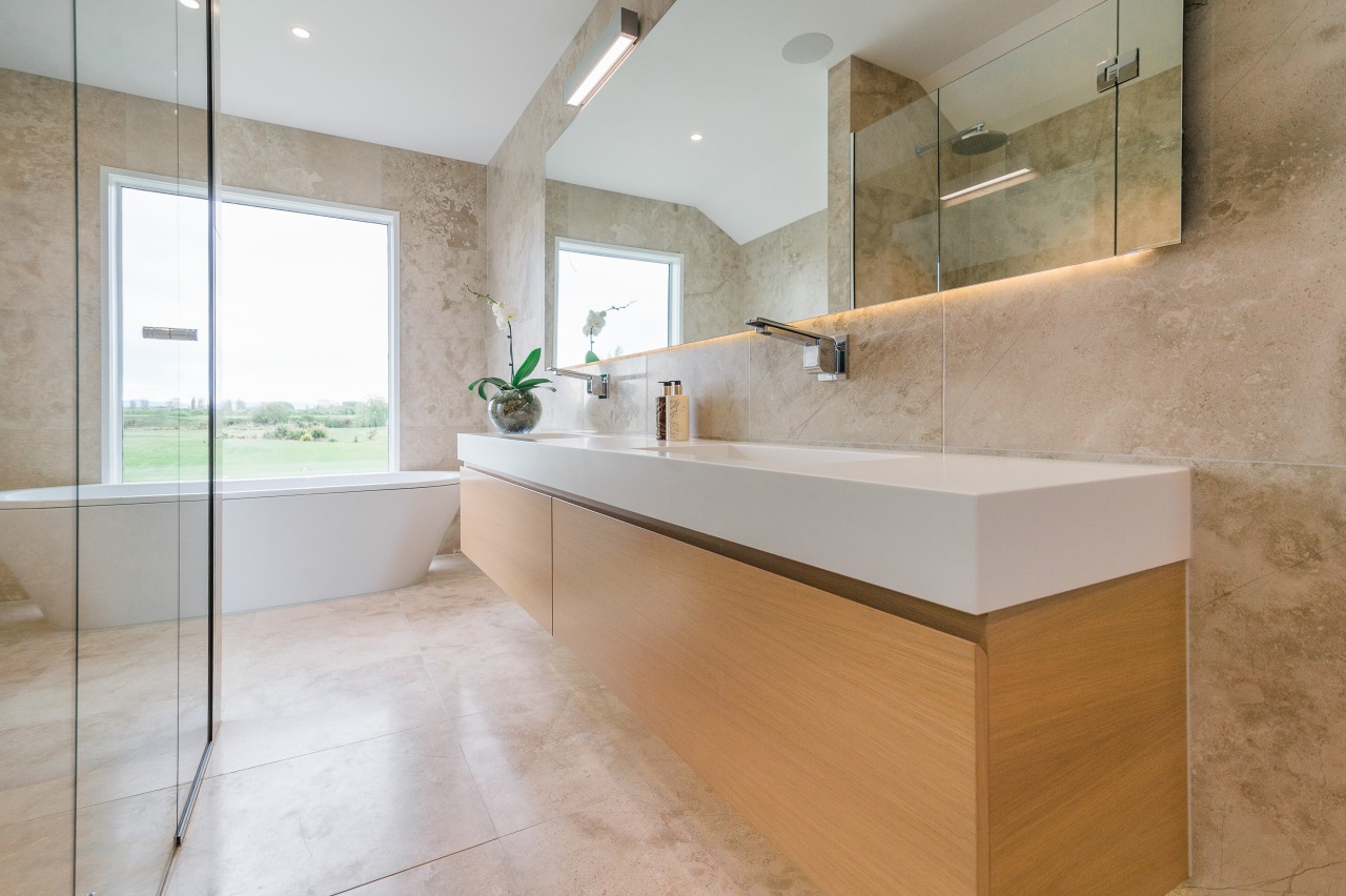 Vanity, glass-fronted shower stall, and the long wall architecture, bathroom, countertop, floor, flooring, home, interior design, real estate, room, sink, tile, gray