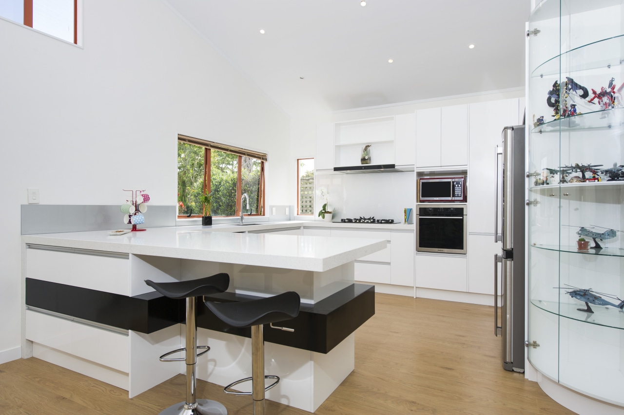 This crisp, contemporary white kitchen was designed and countertop, interior design, kitchen, room, white