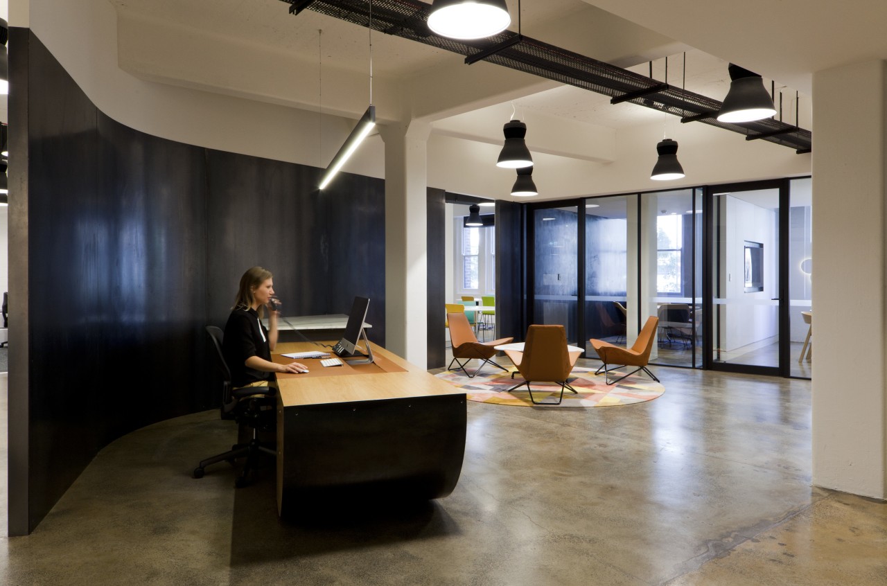 In this fit-out at Tanner Kibble Denton Architectss floor, flooring, furniture, interior design, loft, office, table, brown, black, gray