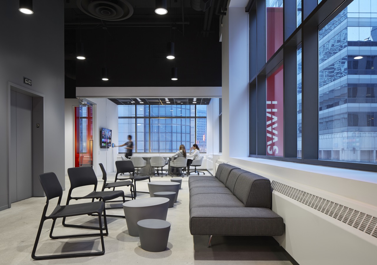 The reinvented, down-sized offices of Havas in Chicago furniture, interior design, living room, lobby, black, gray