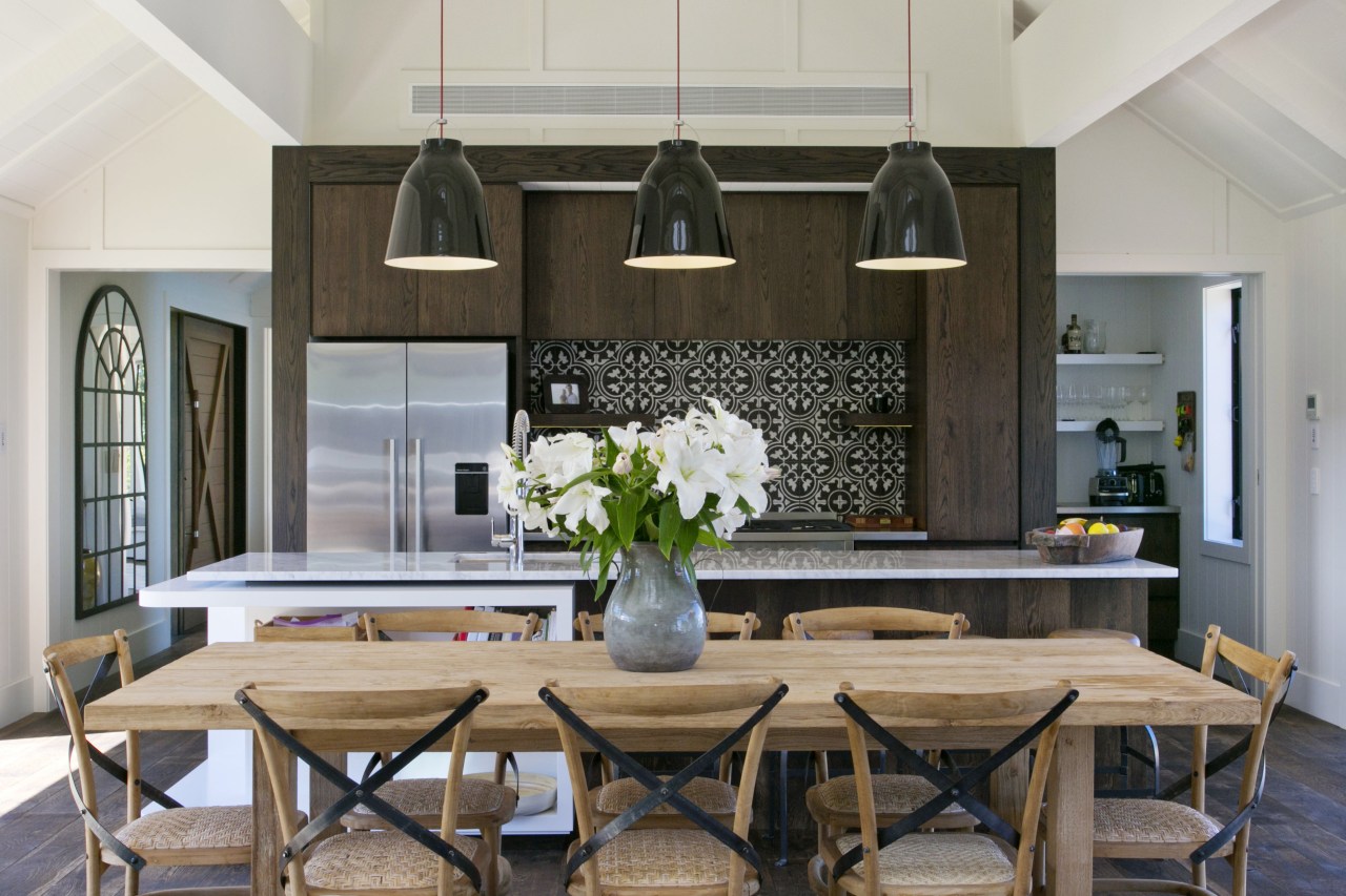 Distressed mismatched oak veneer cabinetry in this kitchen countertop, dining room, furniture, home, interior design, kitchen, room, table, gray, black