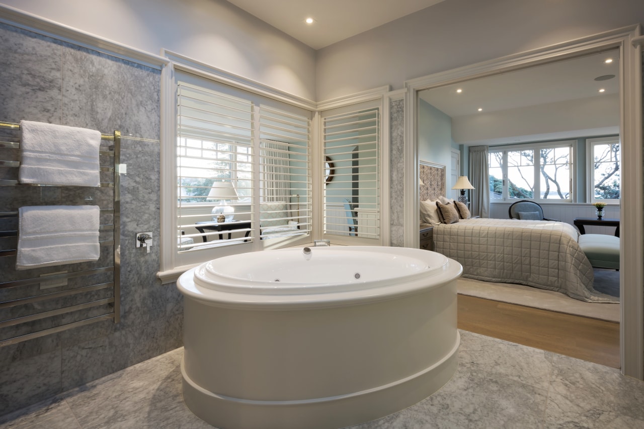 Open sesame  a push of a pocket bathroom, bathtub, estate, floor, home, interior design, real estate, room, window, gray