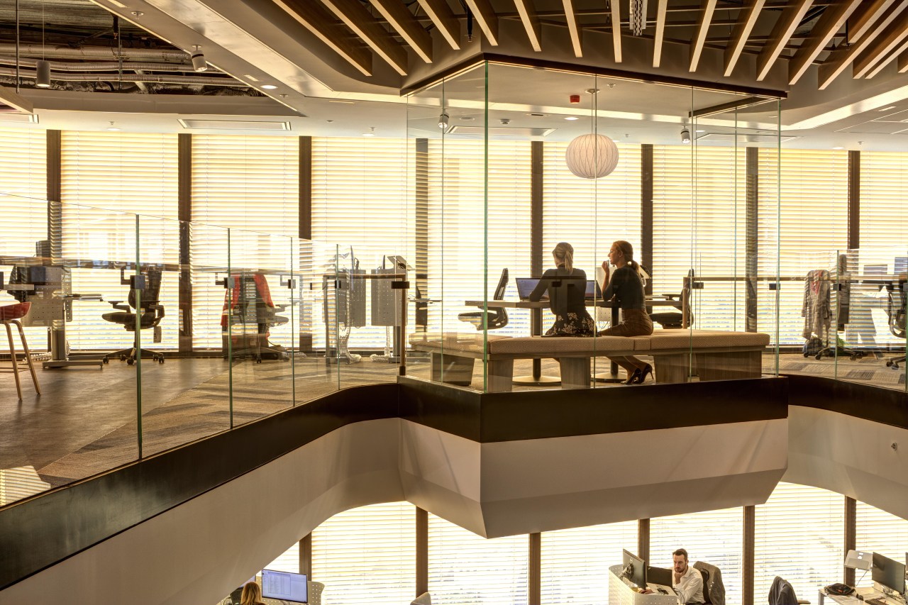 The slatted wood ceiling on the top floor interior design, brown