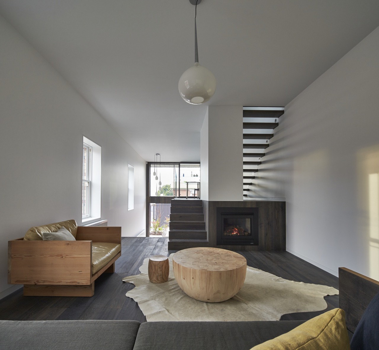 This modern new kitchen, designed by architect Julie architecture, ceiling, daylighting, floor, house, interior design, living room, loft, real estate, room, table, gray