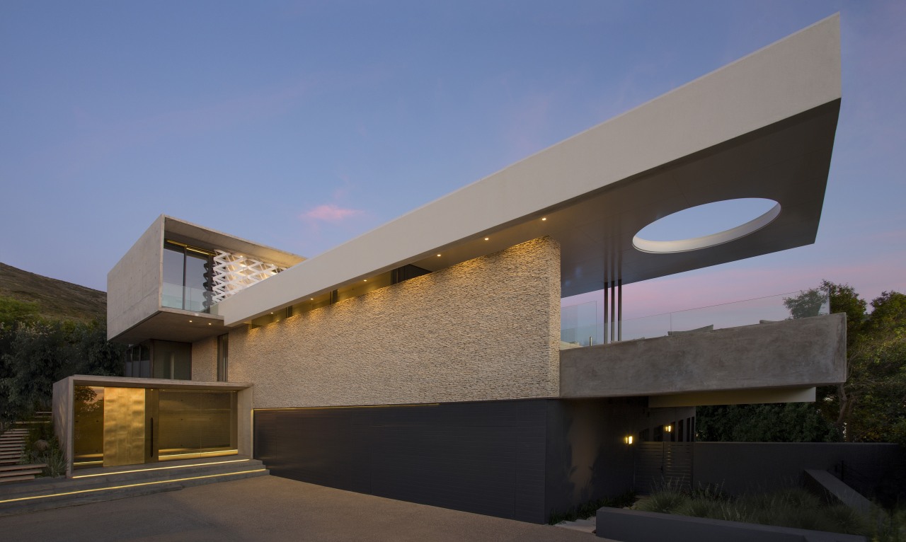 Designed by architects ARRCC, this new hilltop home architecture, building, elevation, estate, facade, home, house, property, real estate, residential area, sky, black, teal