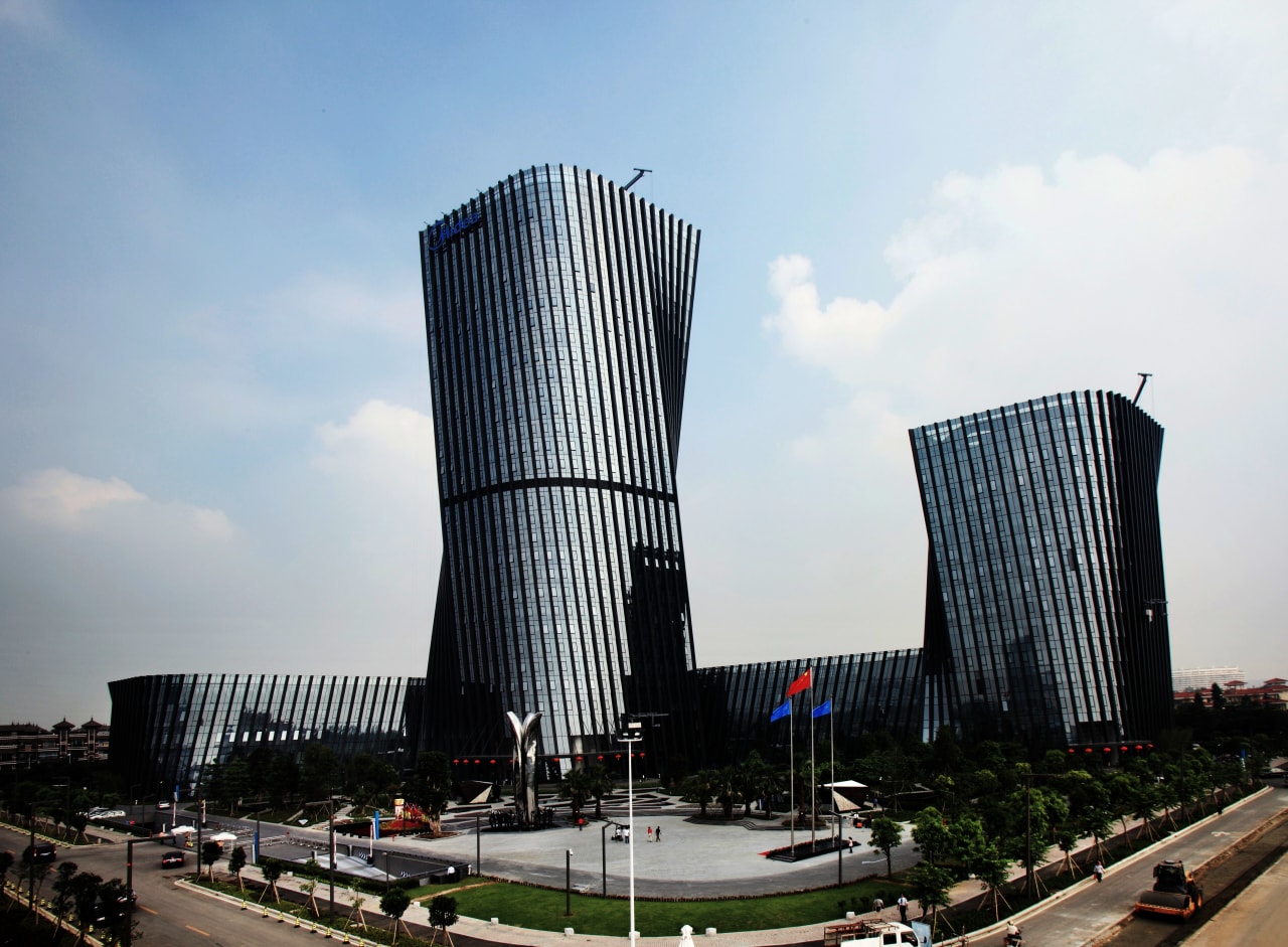 The China headquarters of global manufacturer and distributor architecture, building, city, commercial building, condominium, corporate headquarters, daytime, downtown, headquarters, metropolis, metropolitan area, mixed use, sky, skyscraper, tower block, urban area, white