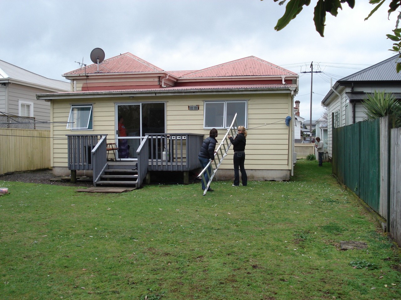 This unattractive lean-to was removed to make way backyard, cottage, grass, home, house, lawn, outdoor structure, property, real estate, residential area, siding, yard, green