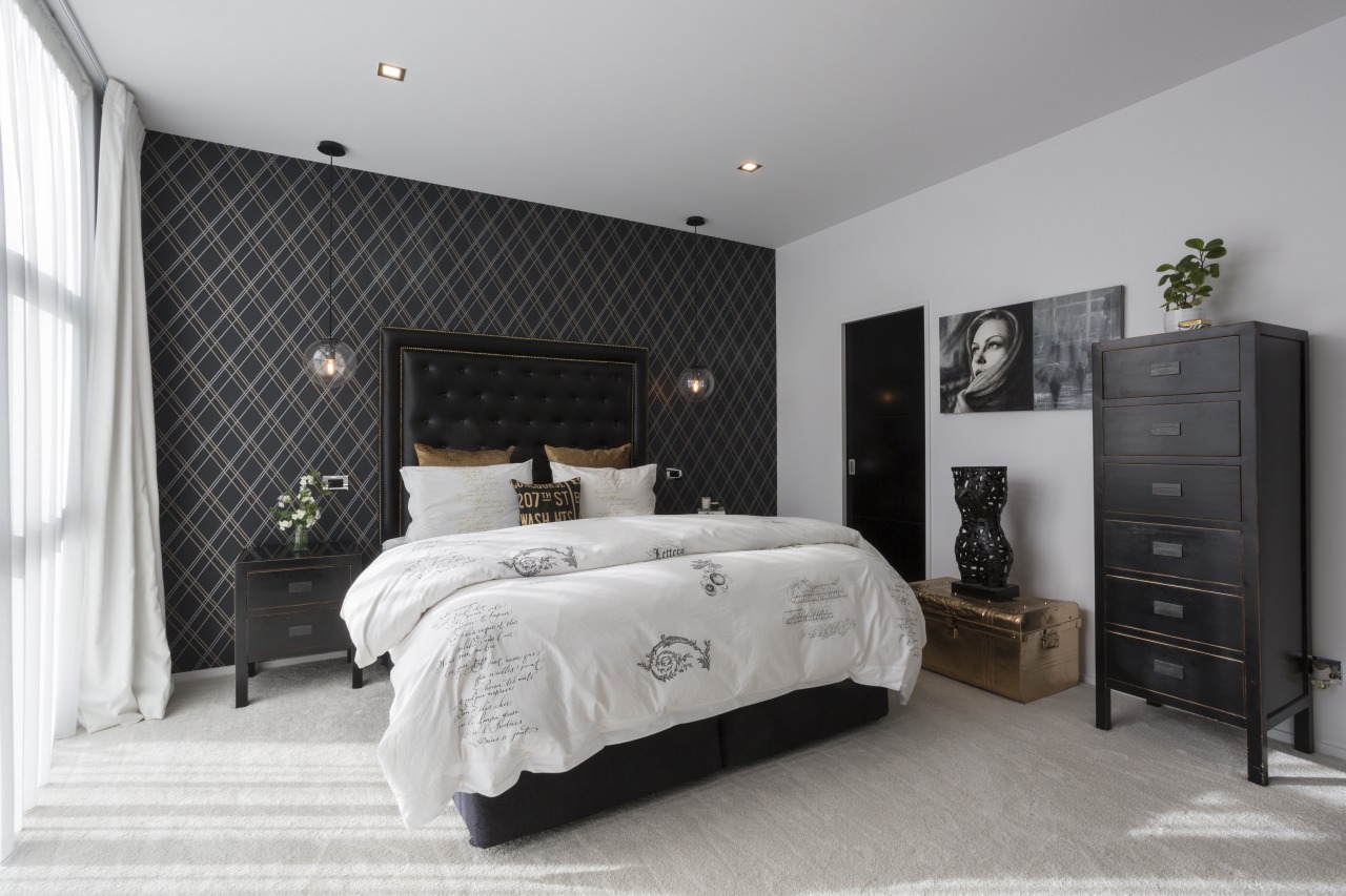 The use of black tones and lustrous hints bed frame, bedroom, ceiling, floor, furniture, home, interior design, room, wall, gray, black