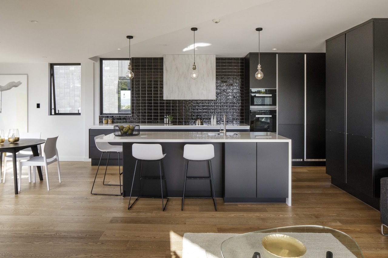 Dark cabinetry surfaces in this kitchen work well countertop, floor, flooring, interior design, kitchen, room, gray, black