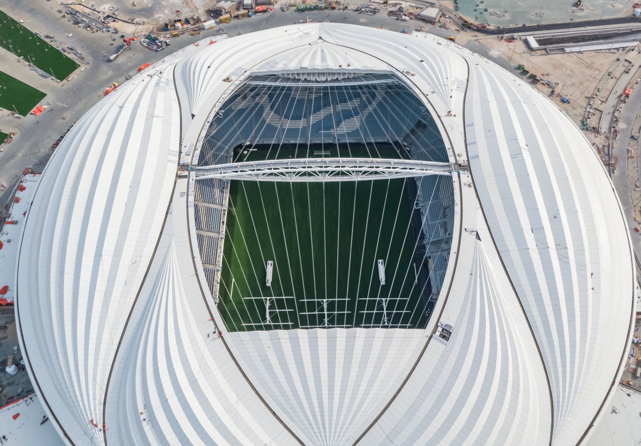 A bird's eye view of the high-tech, high-profile aerospace engineering, daylighting, grass, infrastructure, sport venue, stadium, vehicle, white, gray