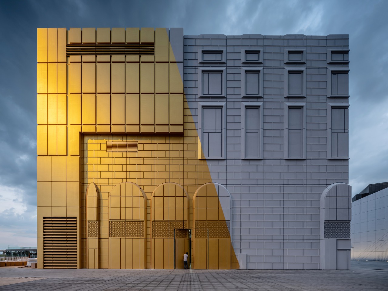 The façades of The Imprint are literally a architecture, building, commercial building, corporate headquarters, daylighting, daytime, elevation, facade, headquarters, landmark, line, real estate, residential area, sky, structure, window, gray